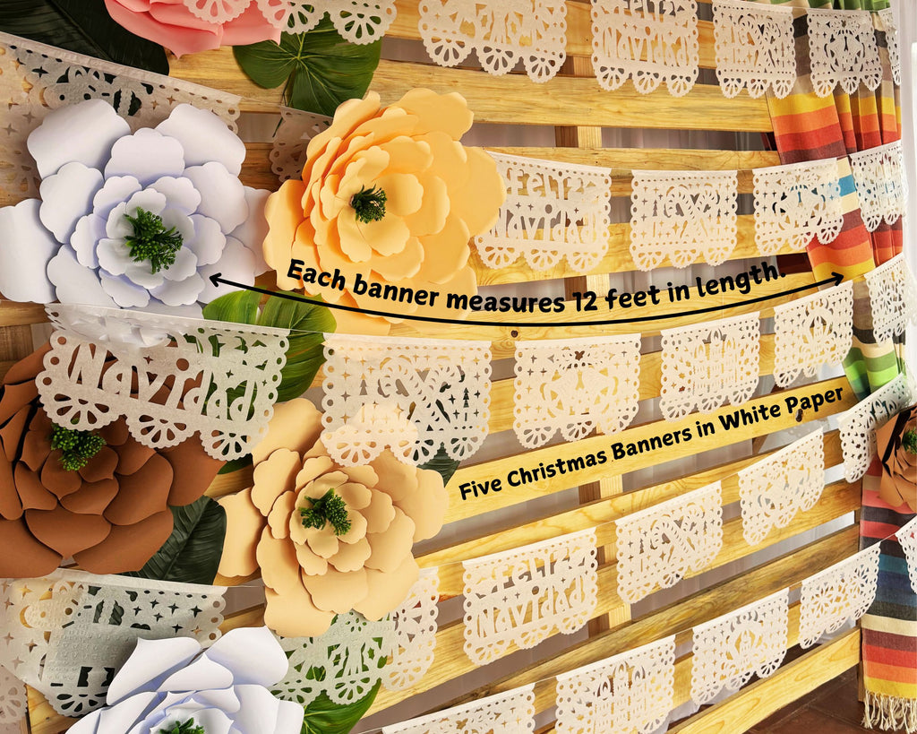 white Feliz Navidad Papel picado with cuto outs of candy canes, bells, pinatas, burros