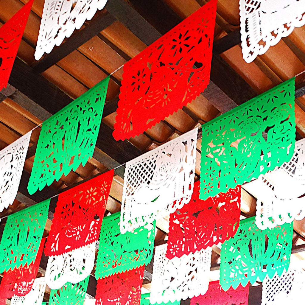 Mexican Independence Day Party Banner tri-color. Green, red and white paper decorations. Mexican independen day papel picado